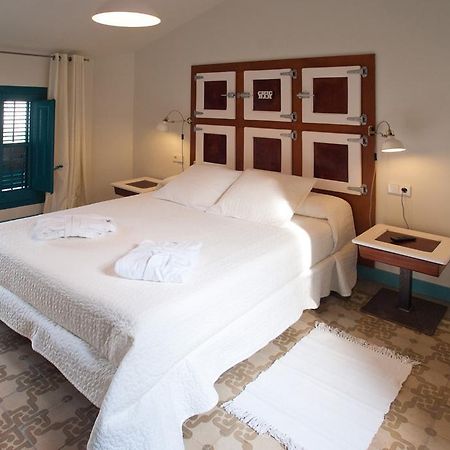 Hotel Hostal Chic Sant Feliu de Guíxols Quarto foto