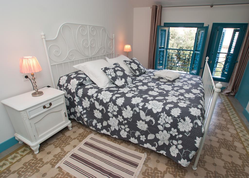 Hotel Hostal Chic Sant Feliu de Guíxols Quarto foto