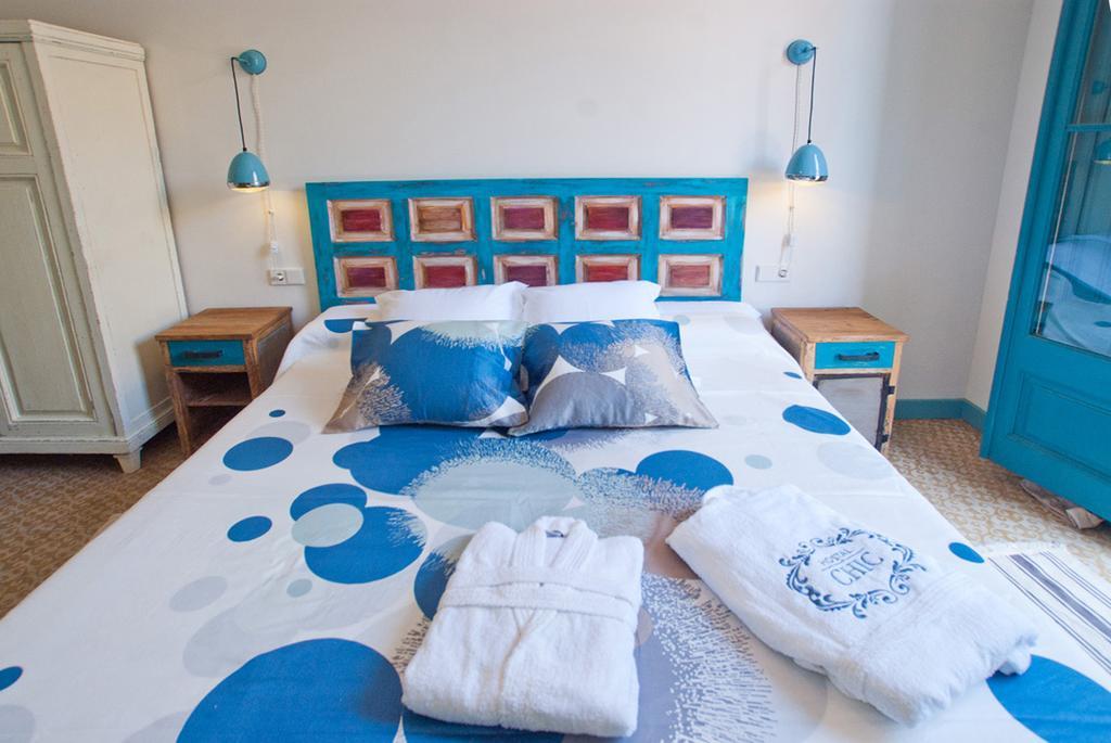 Hotel Hostal Chic Sant Feliu de Guíxols Quarto foto